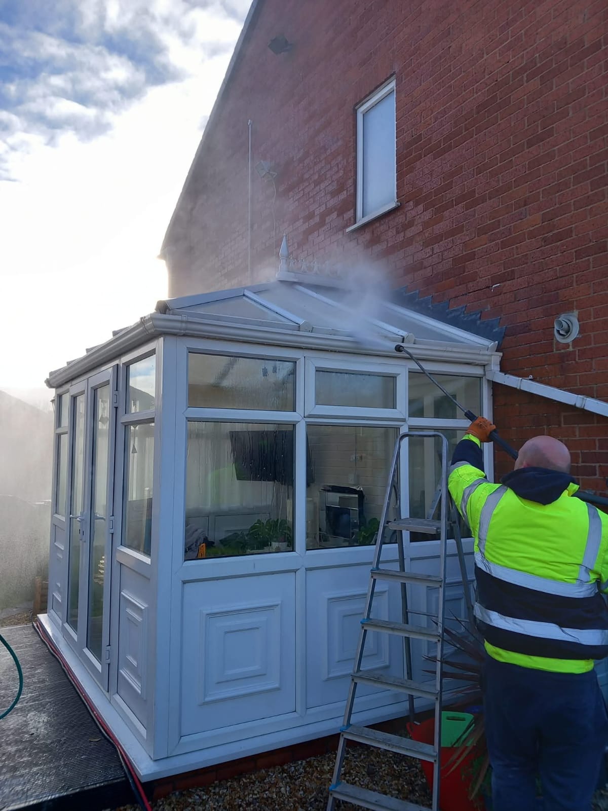 Roof tile repair and moss removal